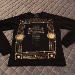 Black sweatshirt with front design.